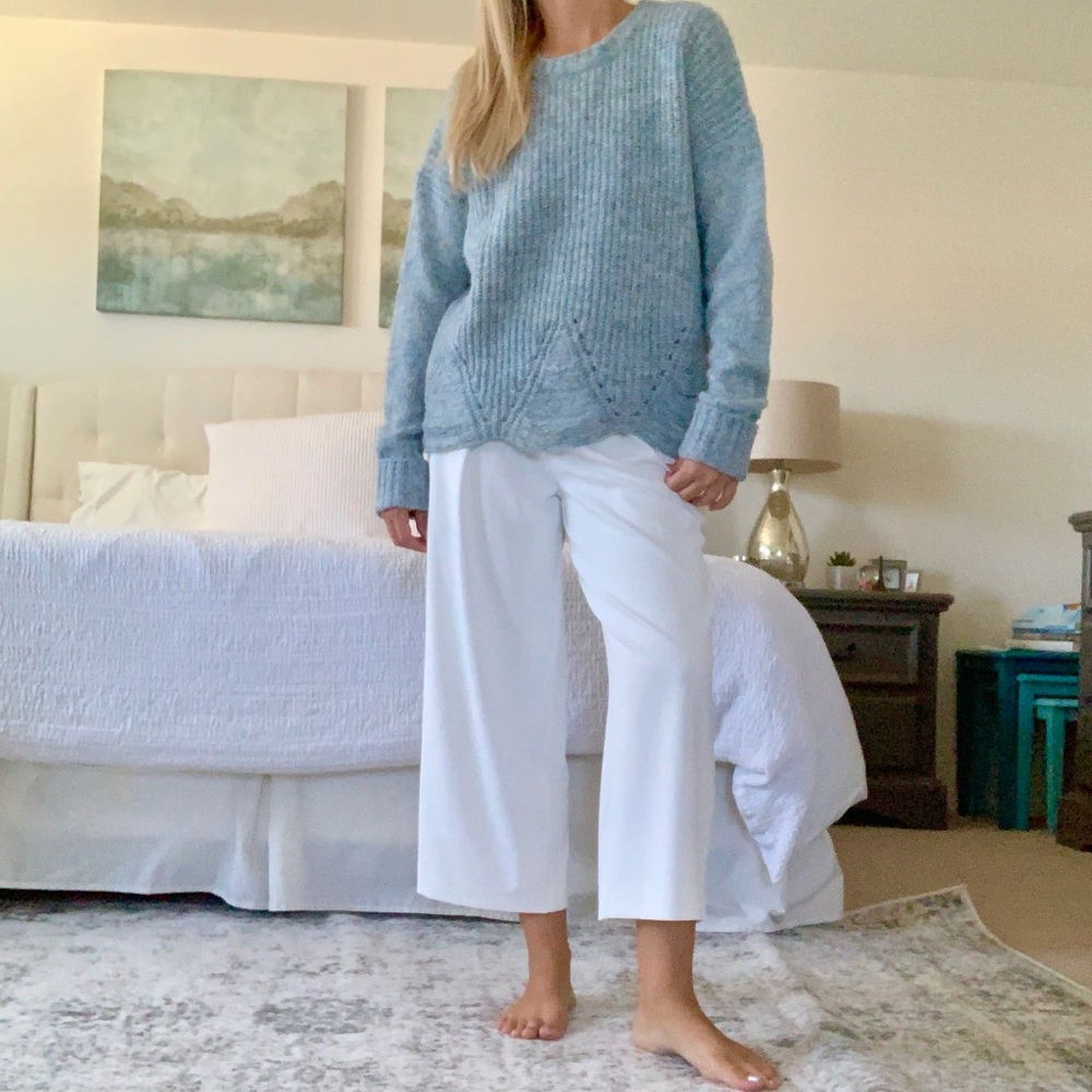 Distressed blue sweater